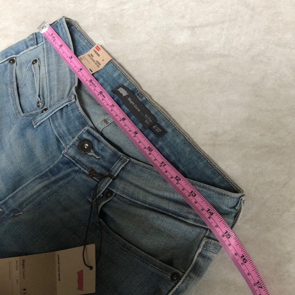 Levi's Woman’s Slight Curve Mid Rise Light Blue Slim Jeans Size 4 27X32 - Picture 8 of 13